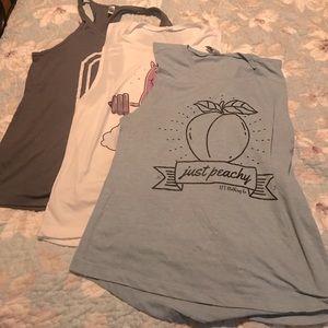 Bundle of 3 workout tanks. 2 muscle and 1 racer